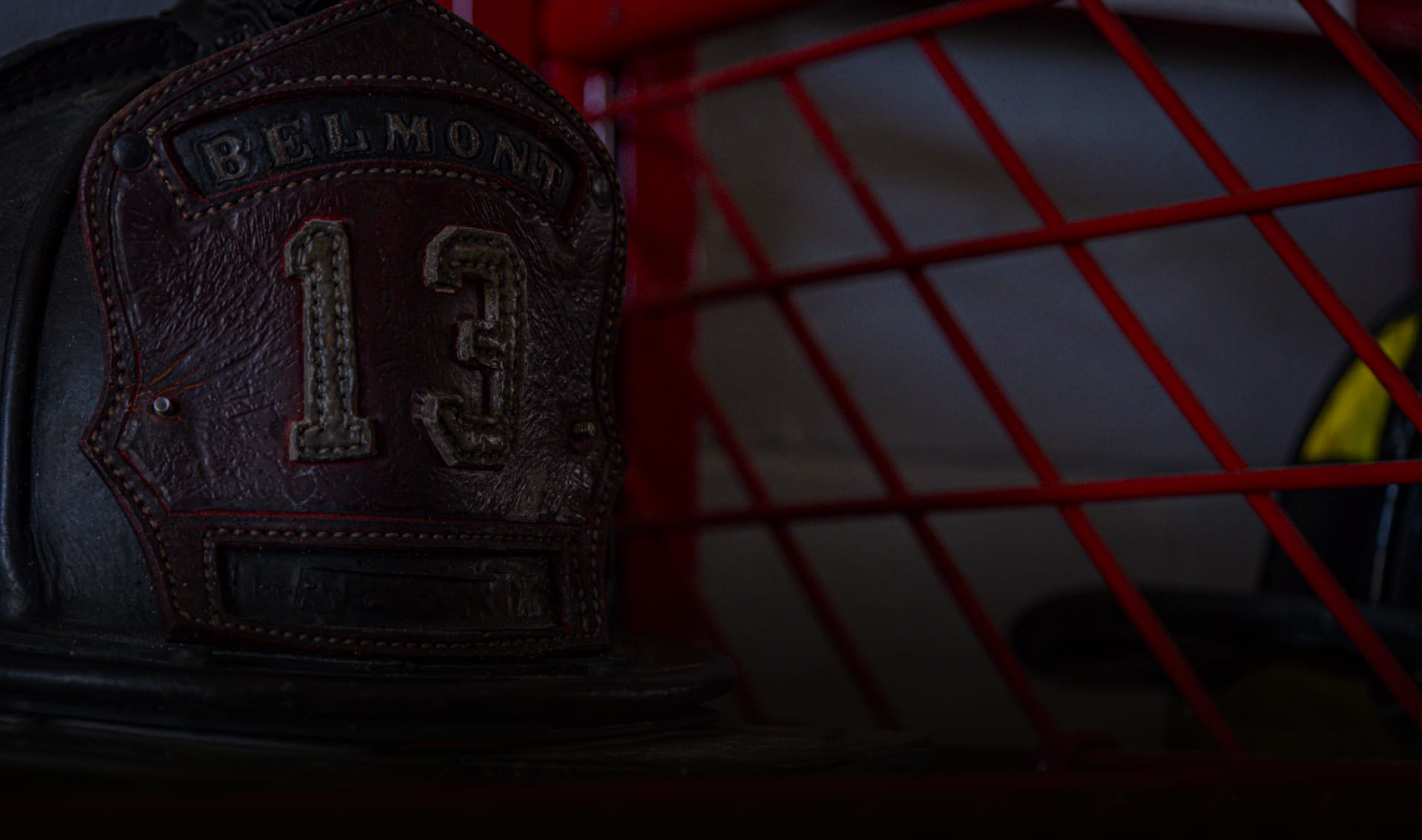 A Belmont firefighters hat on a shelf