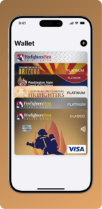 Smartphone displaying FFCU digital wallet with multiple Firefighters First credit and debit card options stacked in a list view