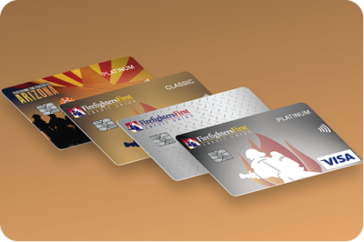 Four Firefighters First Credit Union Visa credit cards fanned out including Arizona Platinum, Classic, and Platinum designs