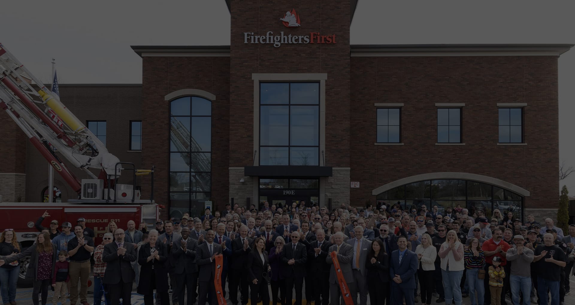Group of Firefighters First Credit Union Employees outside of the Hendersonville office on opening day