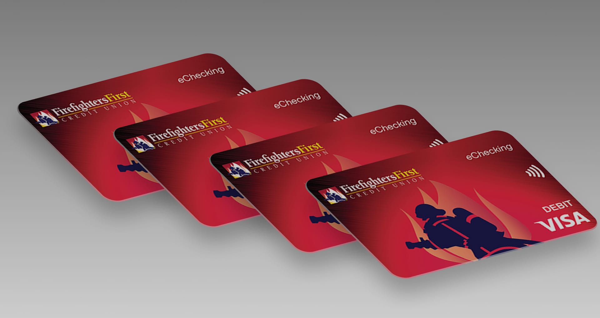 Firefighters First Debit Cards arranged diagonally over a grey background
