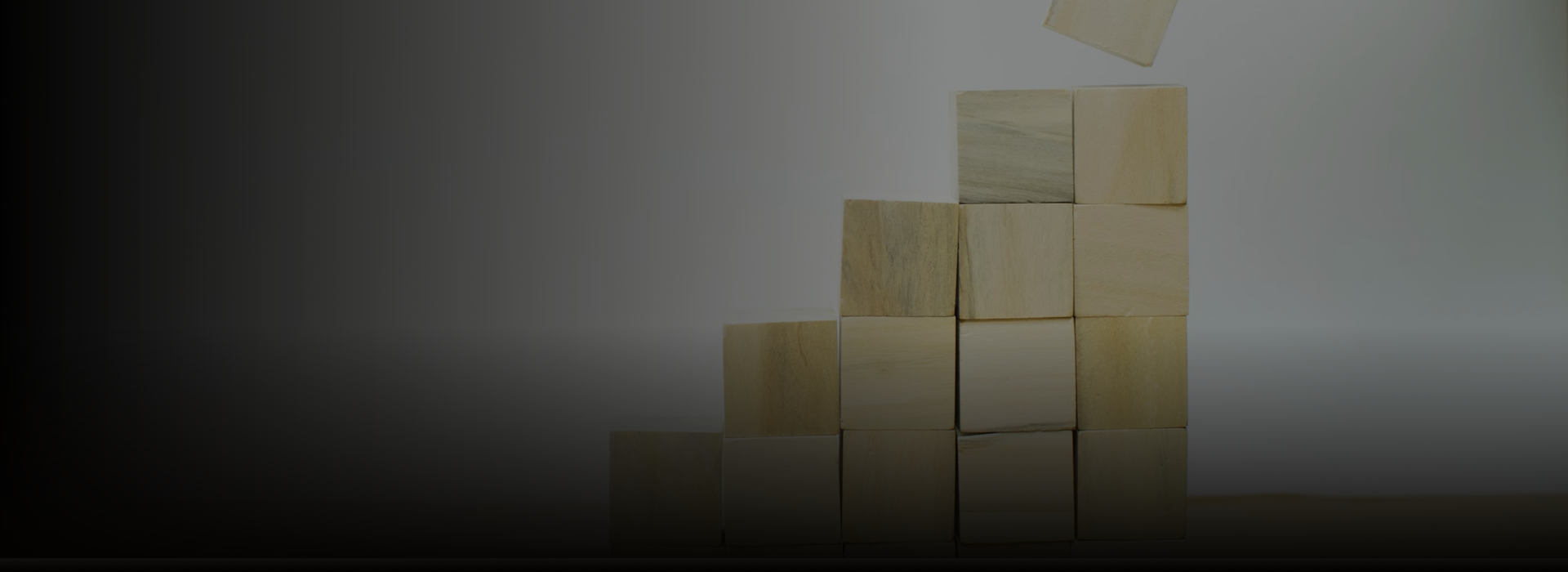 Stacked building blocks arranged on top of each other.