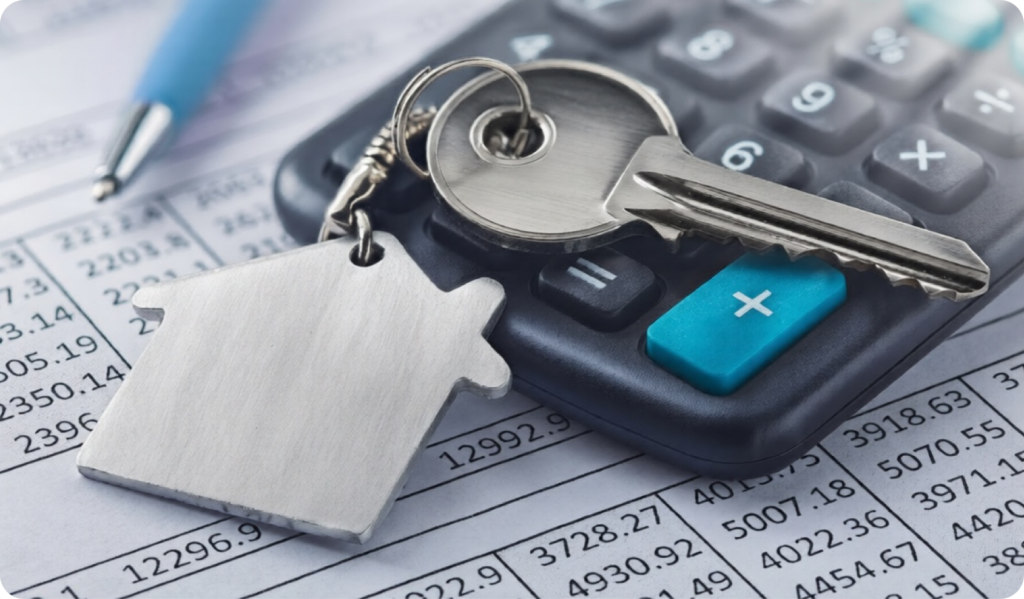 Keys with a house keychain and calculator