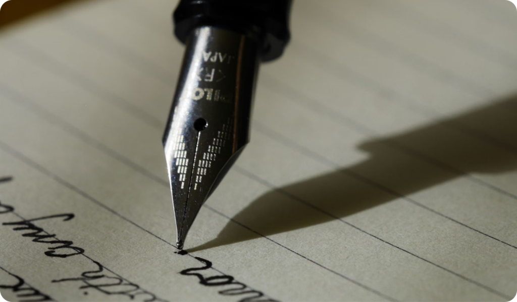 Pen writing on paper