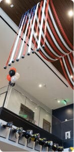 ribbons hanging from the ceiling creating a United States flag