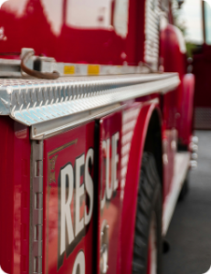 closeup of fire engine, the word 'rescue' visible