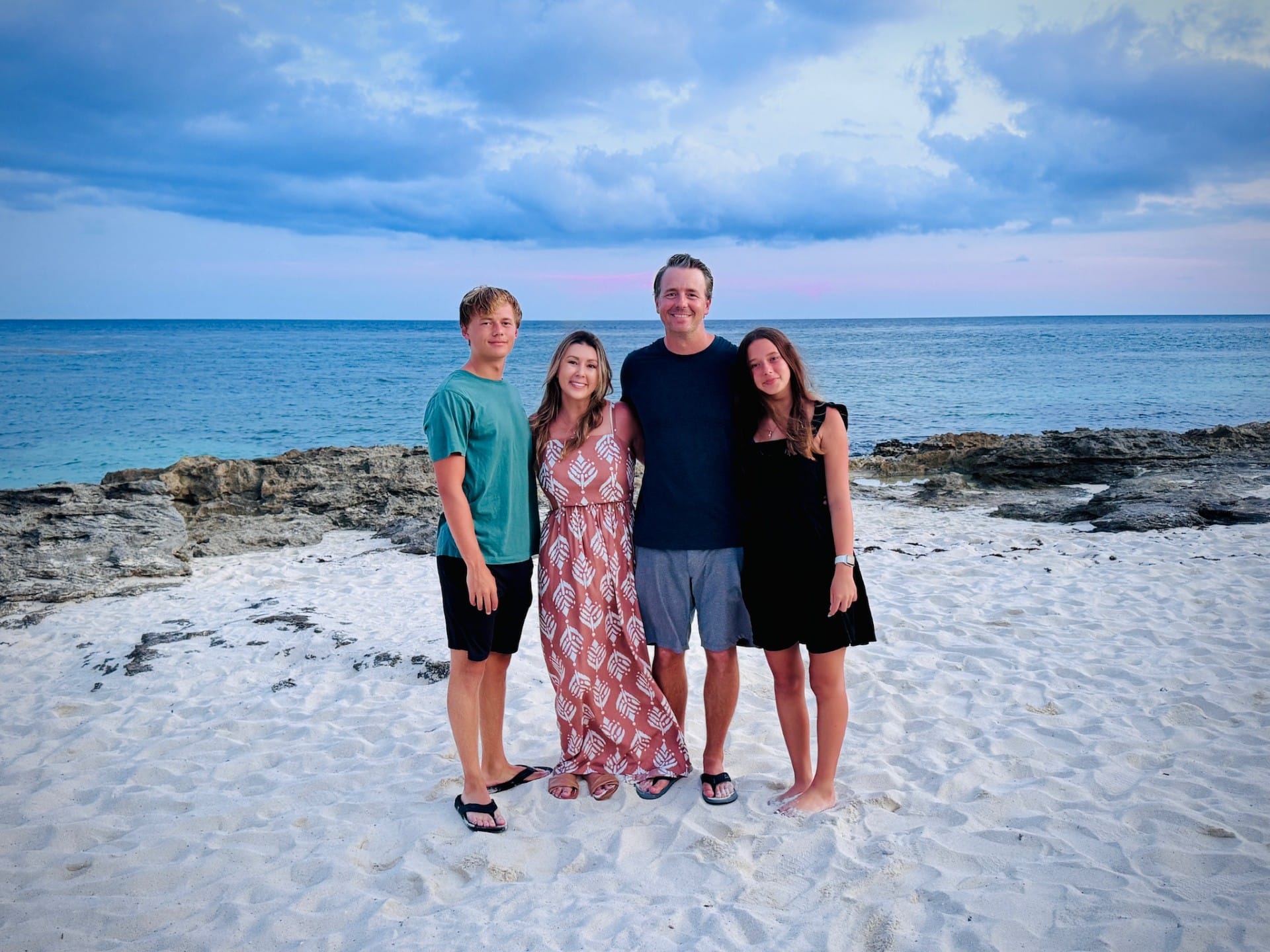 A family of four at the beach