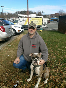 Ricky Holsclaw with service dog