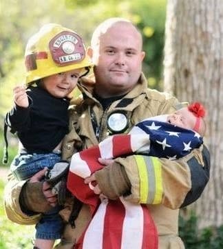 firefighter dad with his kid