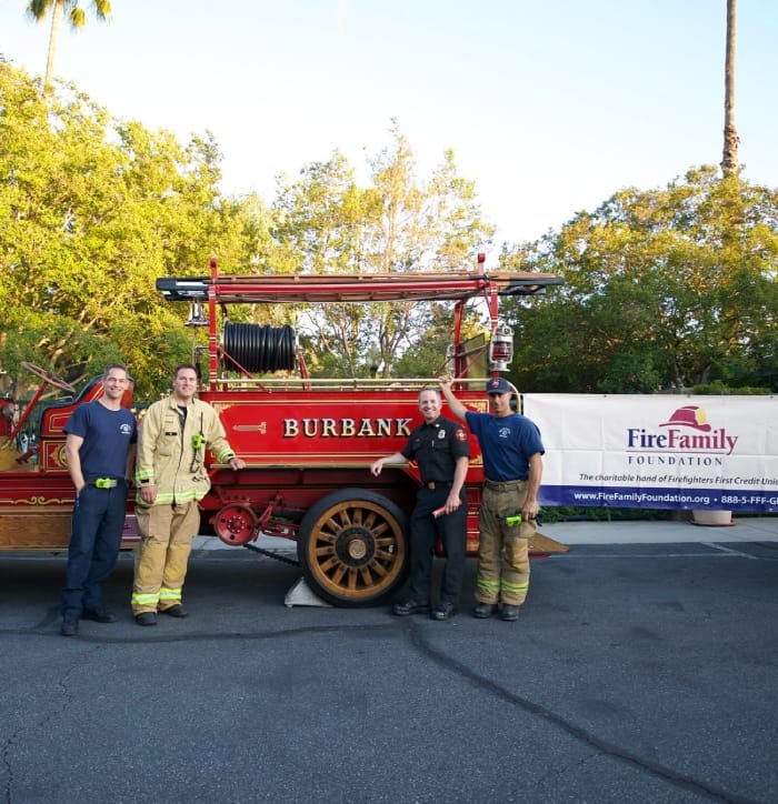 4 firefighters taking picture