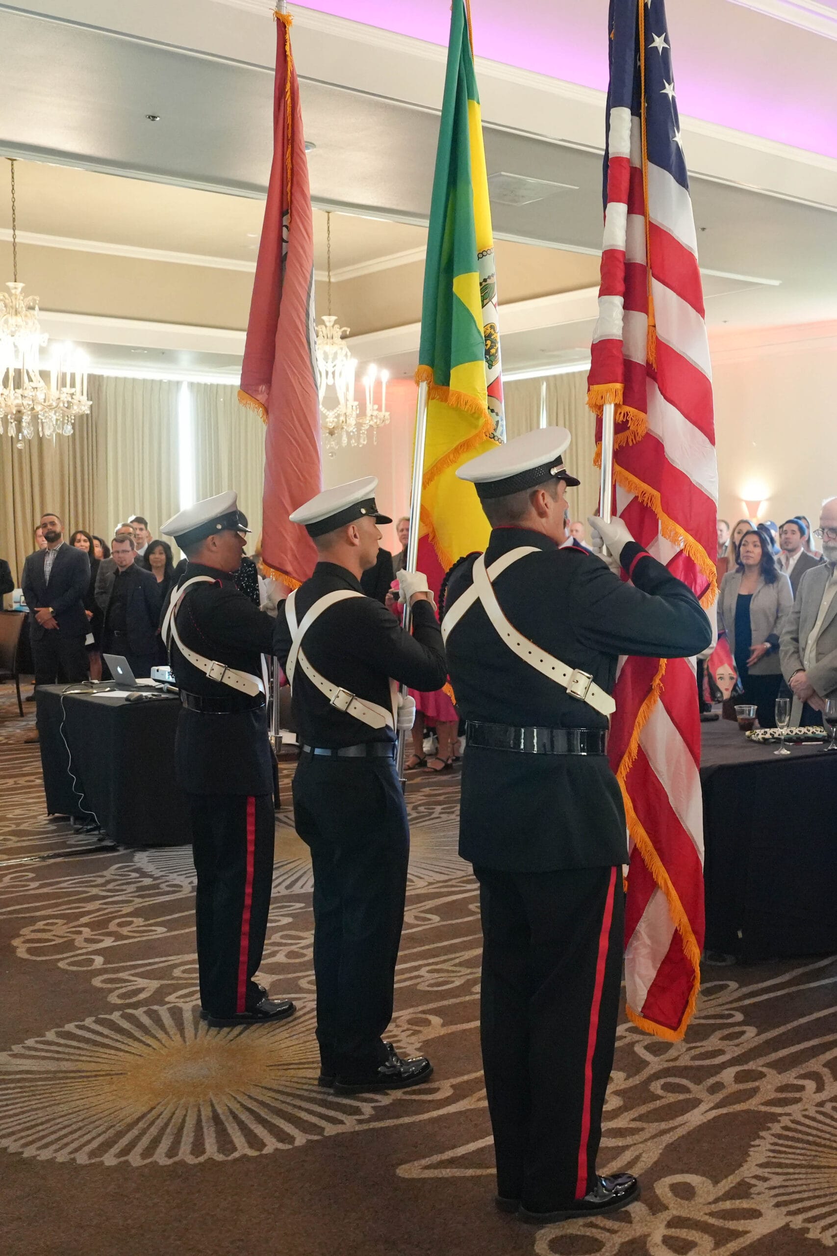 a U.S. Marine Corps Color Guard presenting the flags